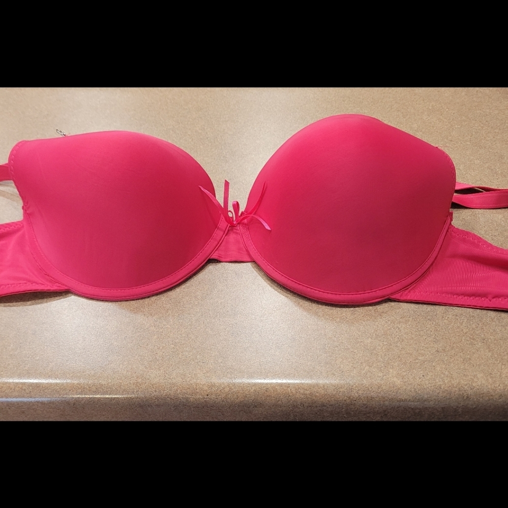 P.R.C hot pink bra. Lightly padded with Silver hooks. Adjustable straps.